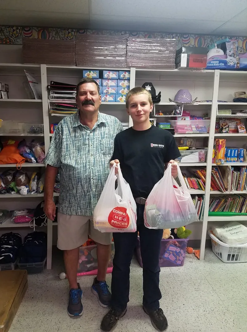 Volunteers delivering donated supplies for children in CPS care